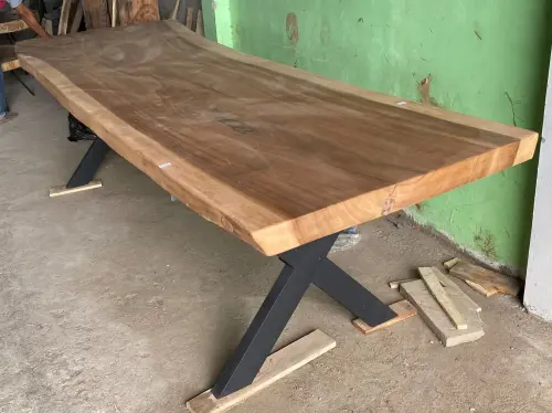 Product image of the product “Natural wood table suar with metal legs X-style, 314cm length, 107cm width, 83.5 cm height. Table top 7cm thickness ”